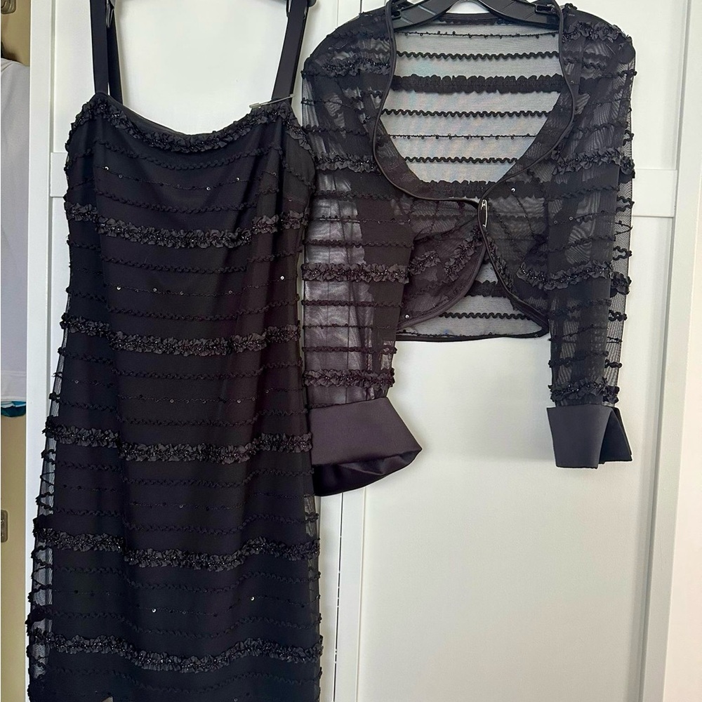 Slimming black evening dress and a top for a woman with curves..